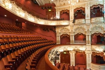 A photo of the rows of seats inside the Lycaem theatre with the lights on