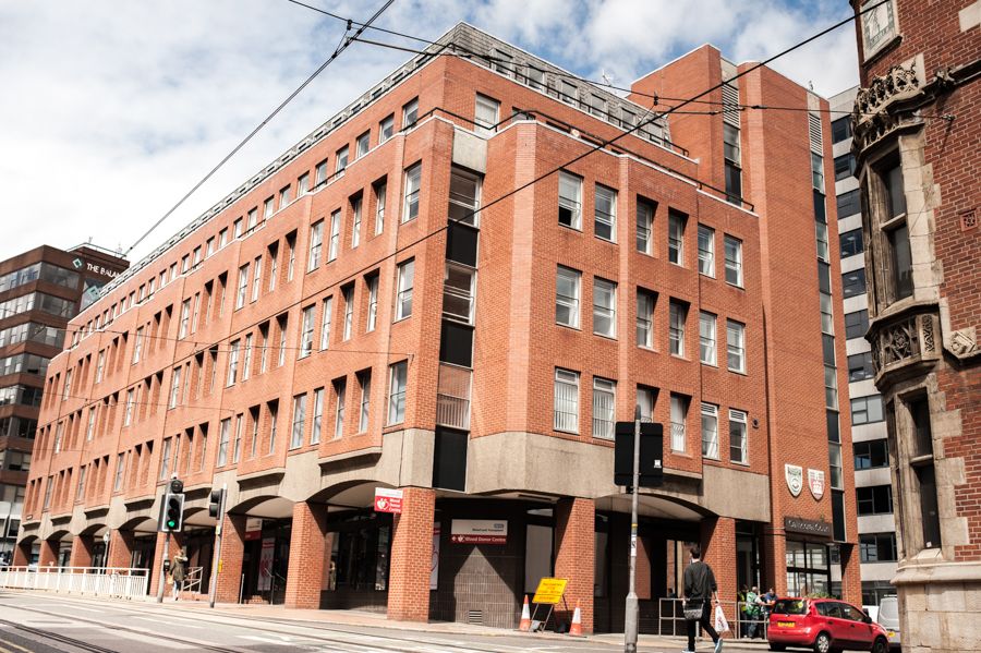 A photo of a red brick building