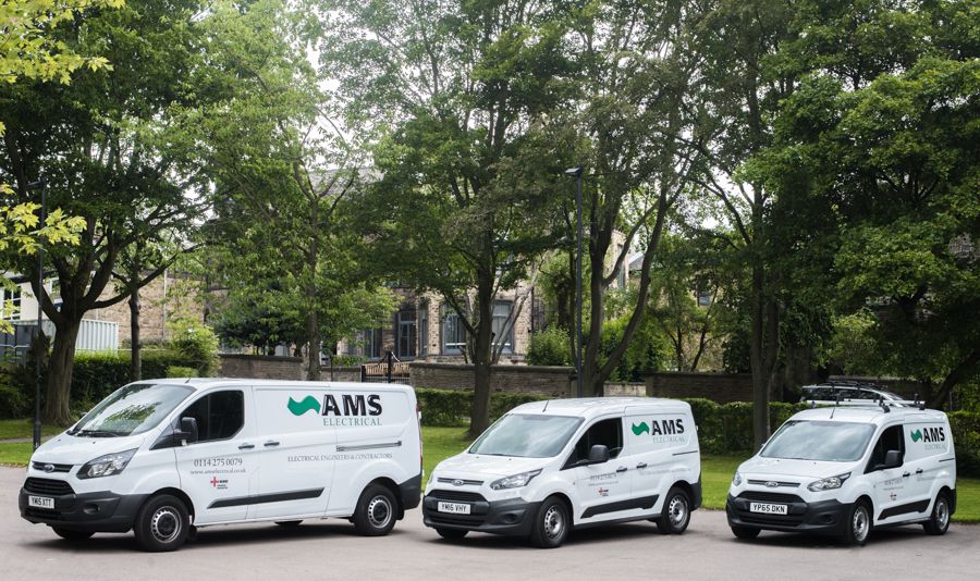 Three AMS Electrical vans lined up